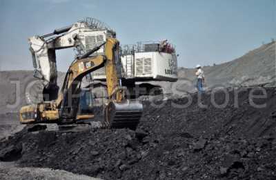 Excavator loading coal