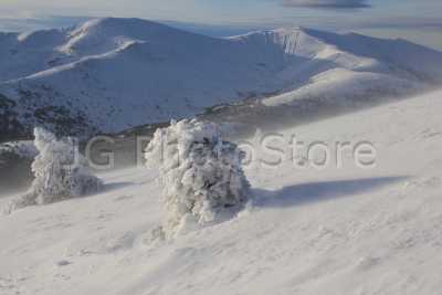 Snowed summits in winter at the Sierra de Guadarrama